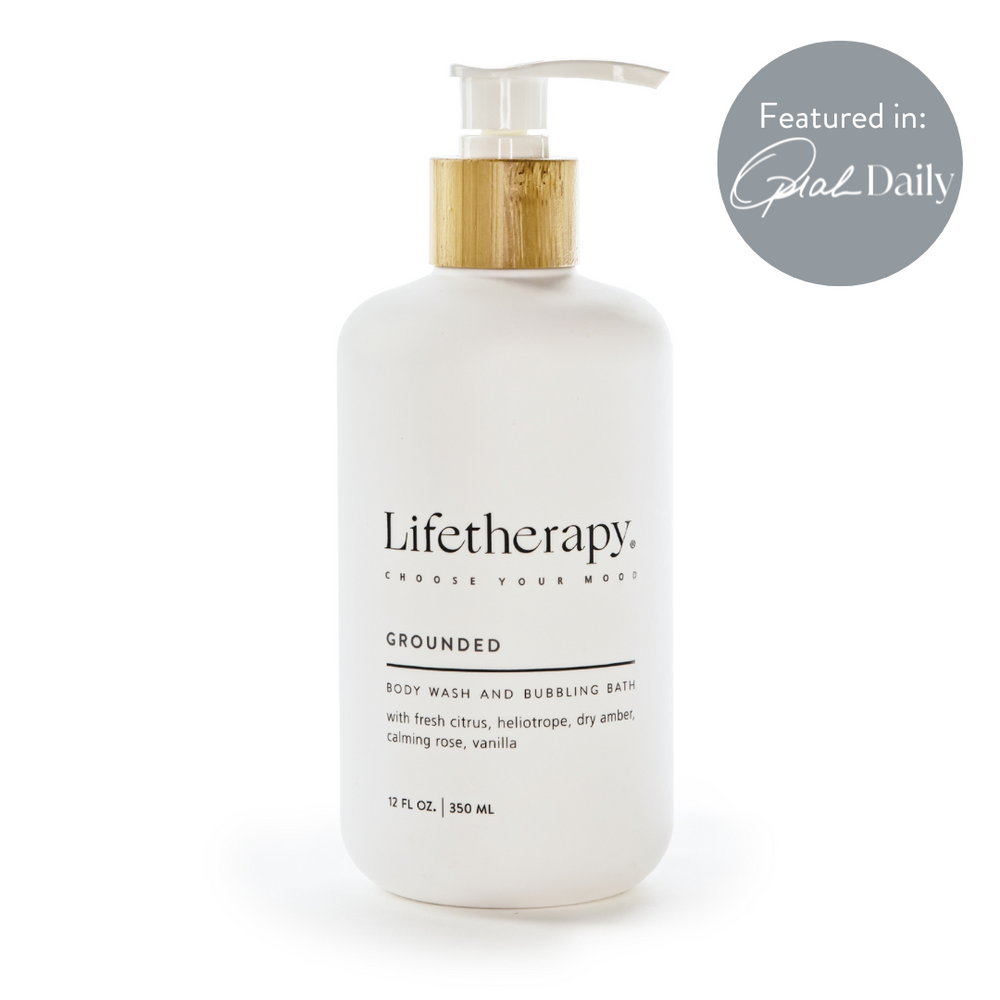 Grounded 3-in-1 body wash and bubbling bath 12 OZ bottle with amber and vanilla scent notes. Featured in Oprah Daily