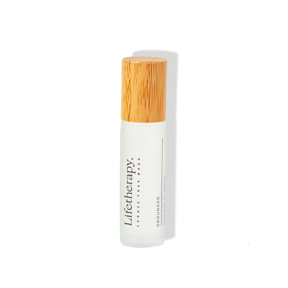Grounded Lifetherapy alcohol-free perfume oil with calming amber and fresh citrus notes